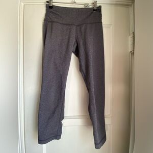 Grey lululemon athletica Cropped leggings with ruched hip & calf zipper workout